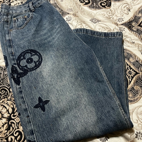 Denim - Beautiful baggy wide leg jeans. With sparkle beading and design is embroidered.